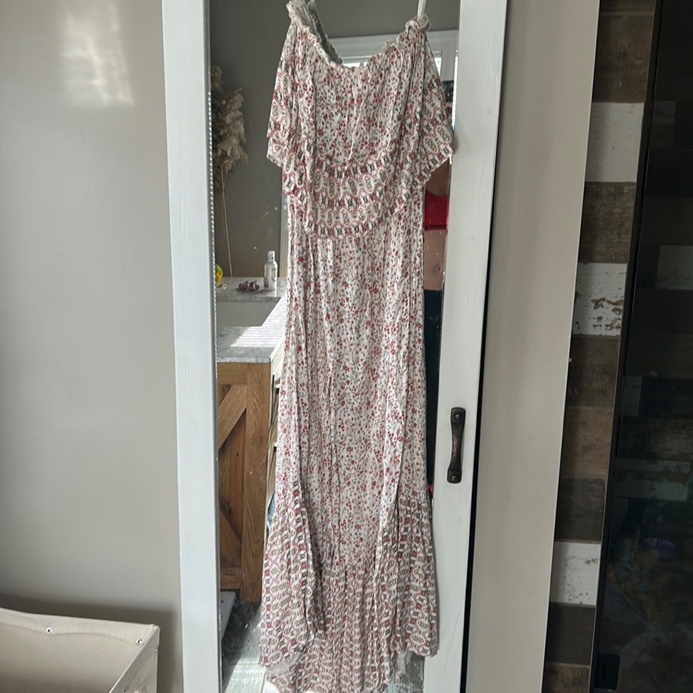 Strapless bell bottom romper